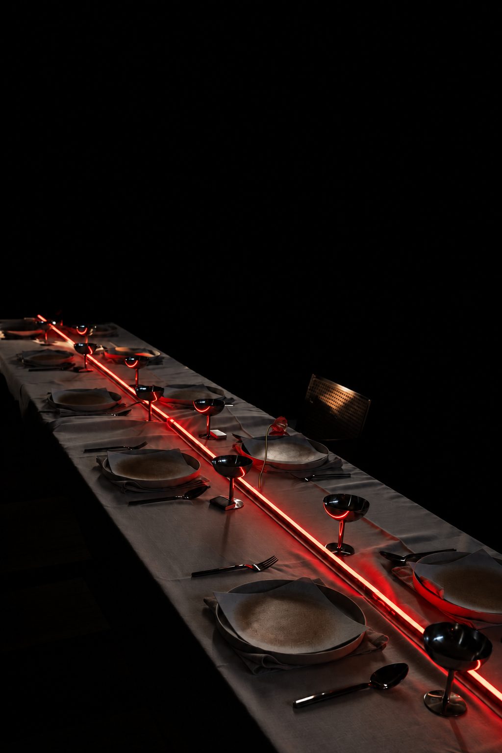 Concept render, a long dark table with a single line of light
